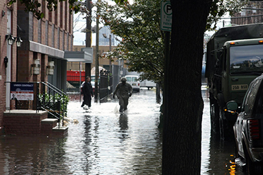 Soldiers with the New Jersey Army National Guard check on residents Wednesday in Hoboken, N.J.